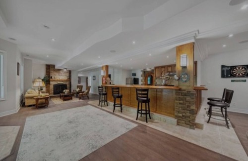 Uxbridge House | Luxurious 5-Bedroom Mansion with Hot Tub, Sauna, Game Room, Wine Cellar, Gym