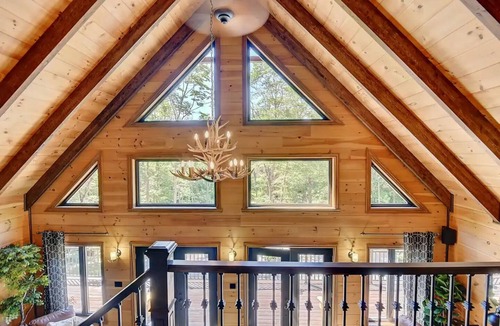 Saint-Calixte Ski Chalet | Luxurious chalet featuring a jacuzzi, pool, small lake, sauna and pool table.