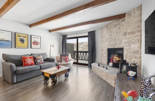 Mont-Tremblant House | Luxury Condominium with Rustic Minimalist Style