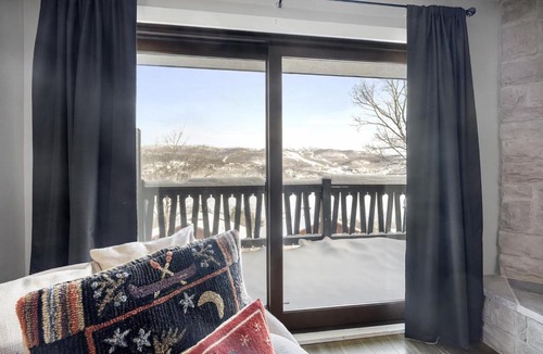 Mont-Tremblant House | Luxury Condominium with Rustic Minimalist Style