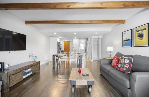 Mont-Tremblant House | Luxury Condominium with Rustic Minimalist Style