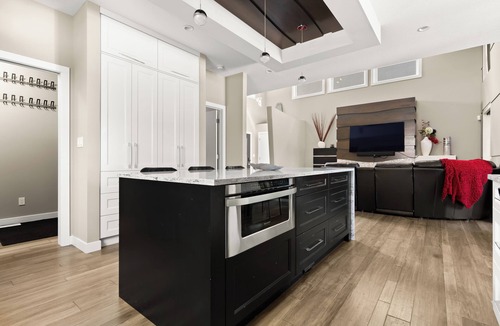 Regina House | Modern Family Retreat with 3 Season Sunroom