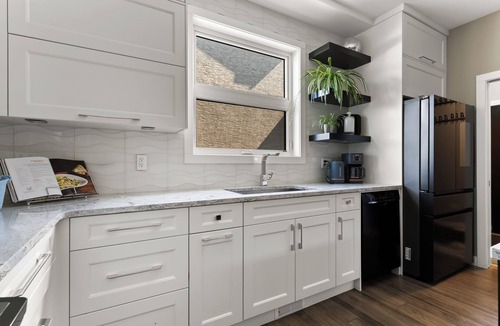Regina House | Modern Family Retreat with 3 Season Sunroom