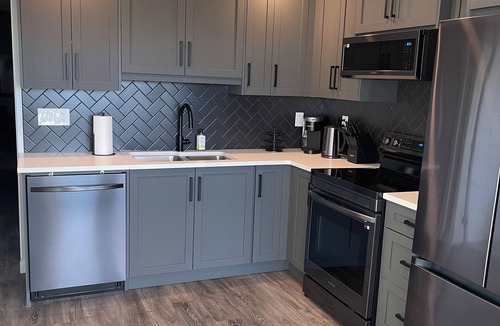 Southeast Calgary House | Modern, private & cozy 1 BR walkout suite in Seton