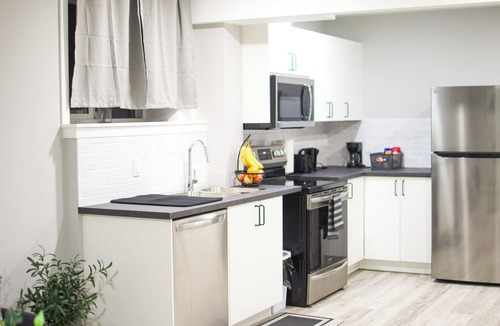 Airdrie House | Modern Private Suite Near YYC | Kitchen, Laundry & Parking