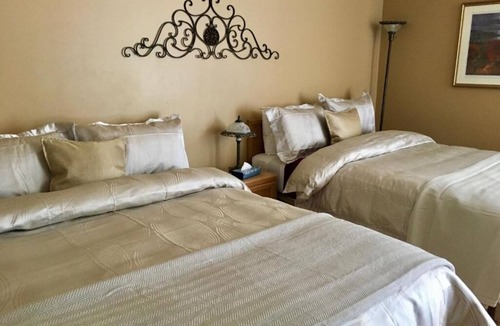 Baie-St-Paul Hotel | Motel Des Cascades: Whirlpool Superior Room