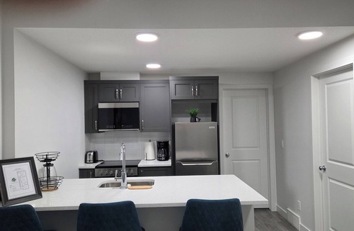 Southeast Calgary House | New Family Modern 2-Bedroom near Hospital, YMCA, Cineplex, Grocery Stores
