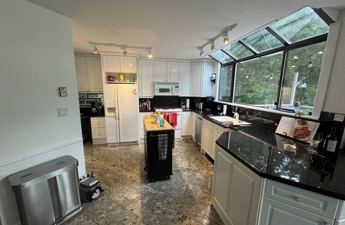 Garden Bay House | Oceanfront property in Pender Harbour with a dock, wrap around balcony with view