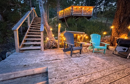 Garden Bay House | Oceanfront property in Pender Harbour with a dock, wrap around balcony with view