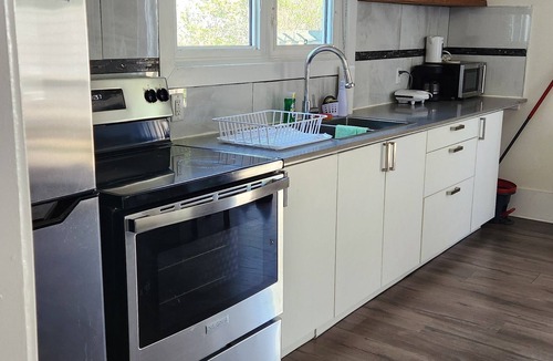 Saint John House | Peaceful Escape-1 queen bed, couch, parking, wifi