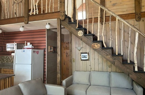 Rangeley Plantation Cabin | Peaceful, Secluded Waterfront Cottage with Sandy Beach