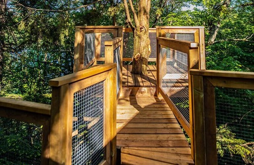 Saint-Faustin-Lac-Carre House | Perched lakeside treehouse, suspension bridge and deck | Lodging #16