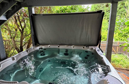 Saanich West House | Pet-friendly home in Victoria. with a full yard, hot tub & private entrance!