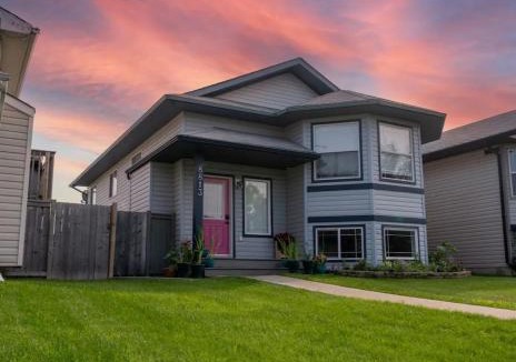 Grande Prairie House | Pink door-ed wonder