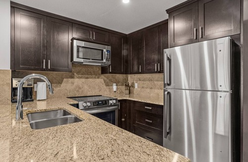 Canmore Apartment | Premier Mountain Retreat [Top Floor/Heated Pool/Hot tub]