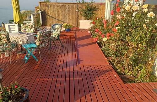 Fairfield Cottage | Romantic Waterfront apartment. Sunrises/Sunsets from Deck.