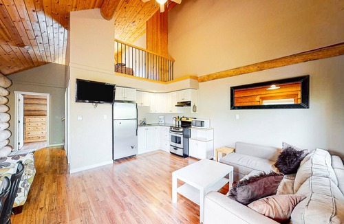 Lac Le Jeune Cabin | Rustic lakefront resort log cabin with deck, internet, and full kitchen