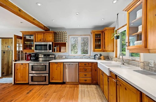 Marmora House | Secluded Riverfront Farmhouse with Pool, Hot Tub & Firepit in Ontario, Canada