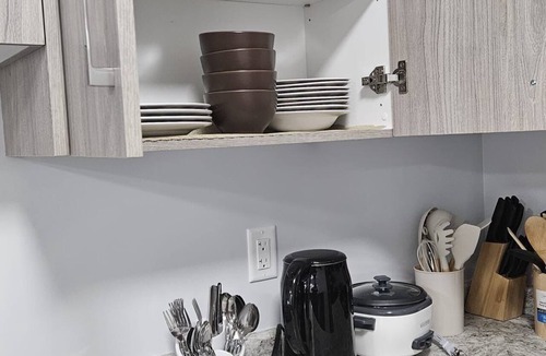 Saskatoon House | Serene cozy and comfortable suite providing home away from home experience.