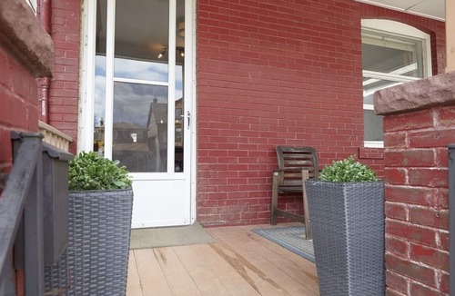 Leslieville House | Side Street Oasis: 2bdrm+Den Open Concept