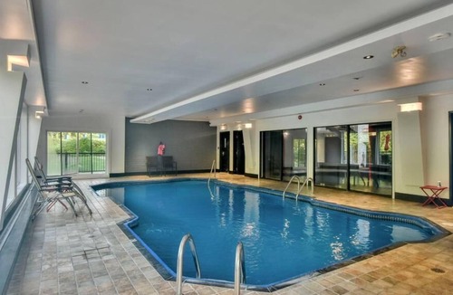 Sainte-Adele Apartment | Small studio in Ste-Adèle, with swimming pool and outdoor spas
