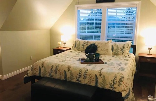 Laidlaw House | Spacious 3 bedroom Guest home with large swim spa and a fire-pit!