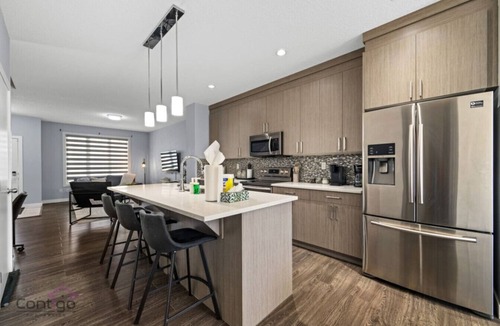North Central Edmonton House | Spacious 6BR Near Rogers & Stadium | Garage | Yard
