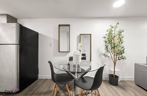 North Central Edmonton House | Spacious 6BR Near Rogers & Stadium | Garage | Yard