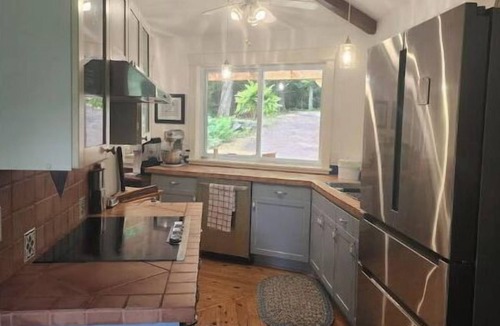 Haliburton House | Spacious, waterfront home surrounded by trees with large dock & games room.