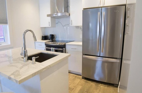 Beaconsfield Village Apartment | Stylish Home in Queen West