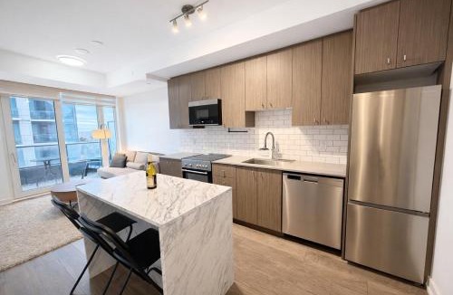 Kitchener Apartment | Stylish Oasis Condo - Gym, Bowling, Pool, Hot Tub
