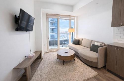 Kitchener Apartment | Stylish Oasis Condo - Gym, Bowling, Pool, Hot Tub
