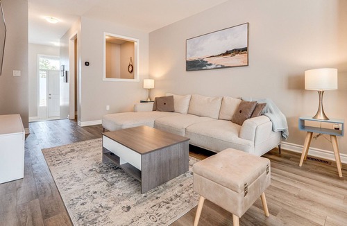 Milton House | "Temporary Tranquility Awaits: 3-Bedroom Townhome in Milton, Ontario