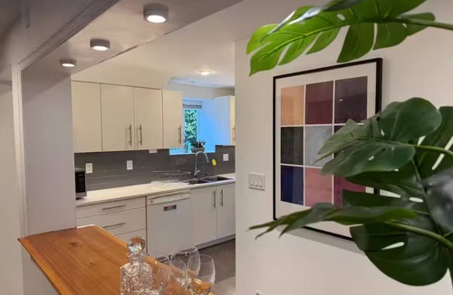 Lynn Valley Apartment | The Black Dog Brookside Cozy Creekside Suite