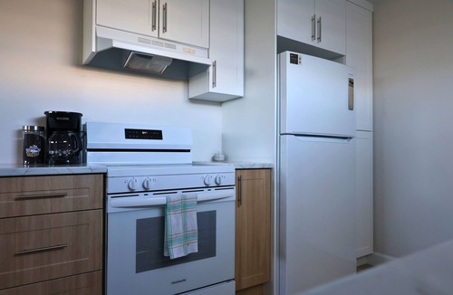 Cochrane Apartment | The Tower Inn - Central Apartment Newly Renovated