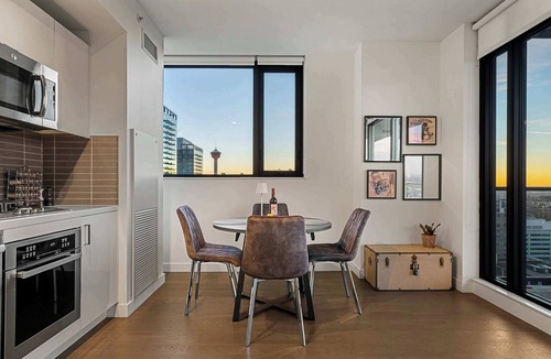 Connaught Condo | Tower Views! Stampede, Pool, FREE Banff Pass!
