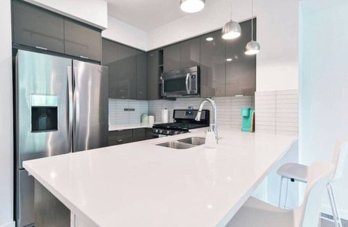 Southwest Calgary Apartment | WALK to Saddledome| "The Aqua" | AC
