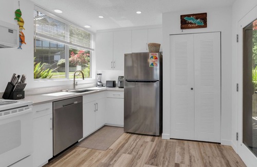 Yellow Point House | Waterfront Renovated unit 2 bed 2 bath with pools & boat dock sleeps 6