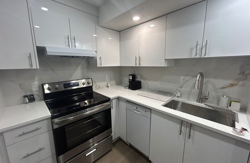 Calgary House | Welcome to Our Cozy Suite.