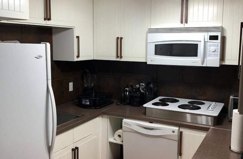 Fort McMurray House | WOOD land House: Spacious 8 Bedroom House
