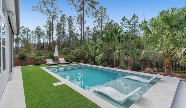 A Refined Modern Sanctuary.nArchitectural elegance meets private resort living.
