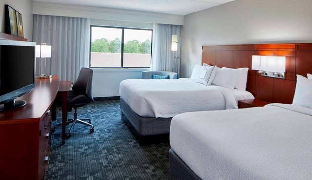 Affordability Meets Comfort! Two Contemporary Units, Free Airport Shuttle!