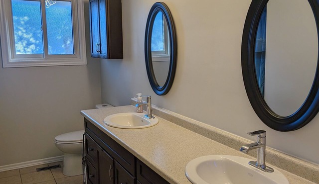 Backyard Oasis with Pool, Hot tub & Fire table. 4 bedrooms, gym, & a yoga area!