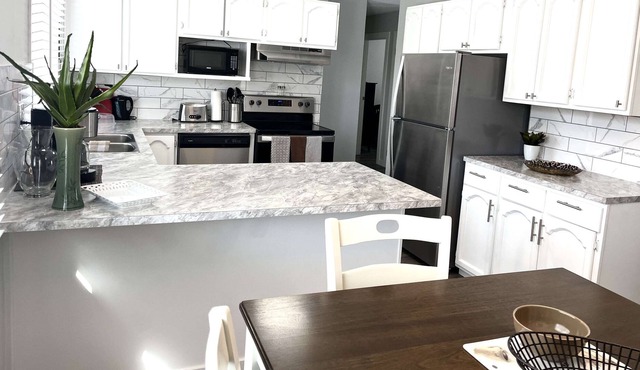 Beautiful Five Bedroom Upgraded Home - Great Location!