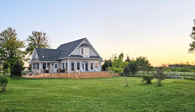 Bright & Airy Beach House – Bay Views, Wraparound Deck & Room to Unwind