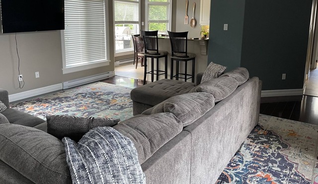 Bright, clean, spacious unit in the upper level of executive home