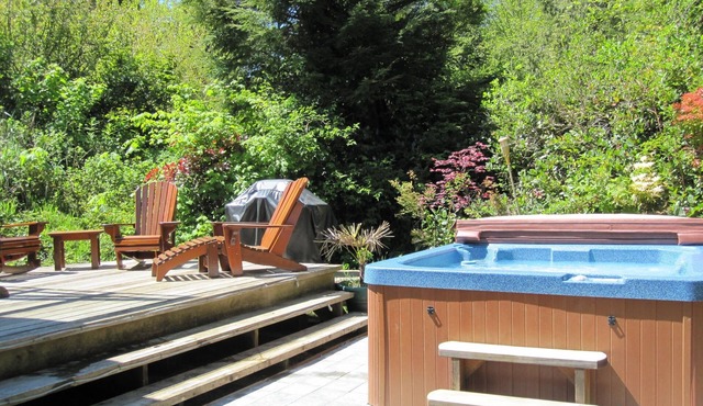 Cedar Shack Cottage with Private Hot Tub - steps to Chesterman Beach