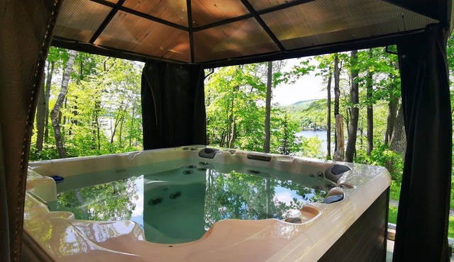 Chalet Le St-phonie, L'harmonie Entre une Chalet, un Boisé, une Rivière