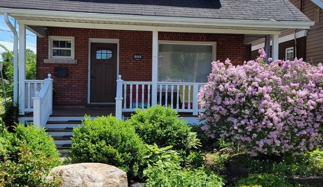 Charming historic home w/parking, walk to downtown, waterfront, shops & more.