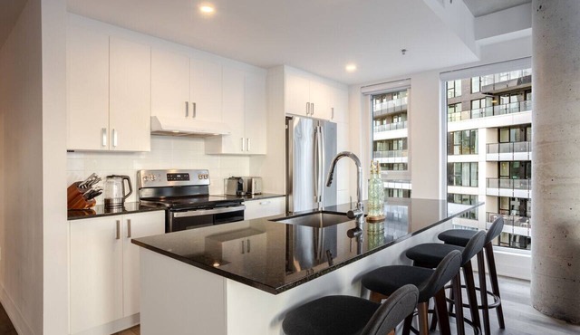 Chic Griffintown Apt | Parking + EV Charger